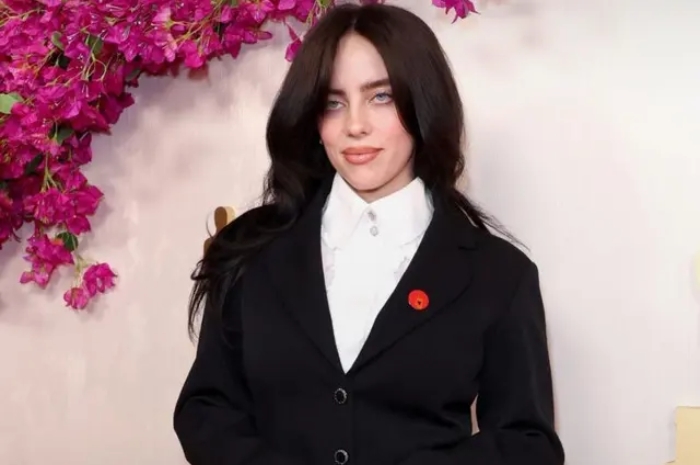 Makna Pin Merah yang Dikenakan Billie Eilish di Piala Oscar 2024, Benarkah Salah Satu Bentuk Dukungan Palestina?